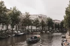 Drift through Amsterdam on a Quiet Electric Open Boat